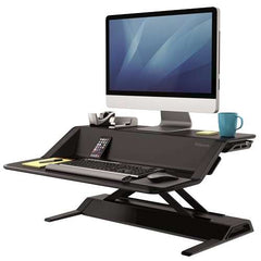 Fellowes Sit-Stand Lotus EstaciÃ³n de Trabajo - 22 Ajustes en Altura - Ofrece una Maxima Estabilidad - Dos Amplias Superficies - Color Negro